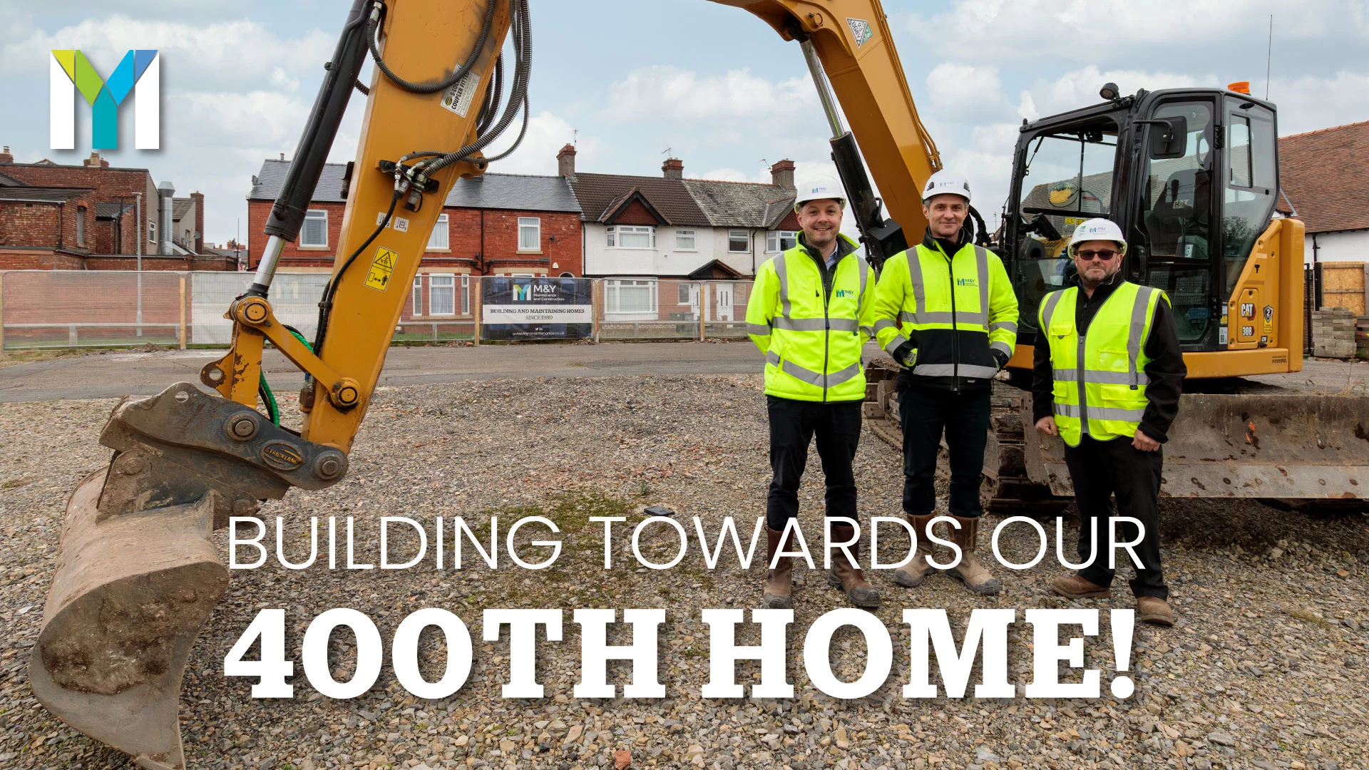 image shows row of houses in background with digger in foreground with three M&Y staff members in high vis' and hard hats. Text over image reads 'building towards our 400th home!'